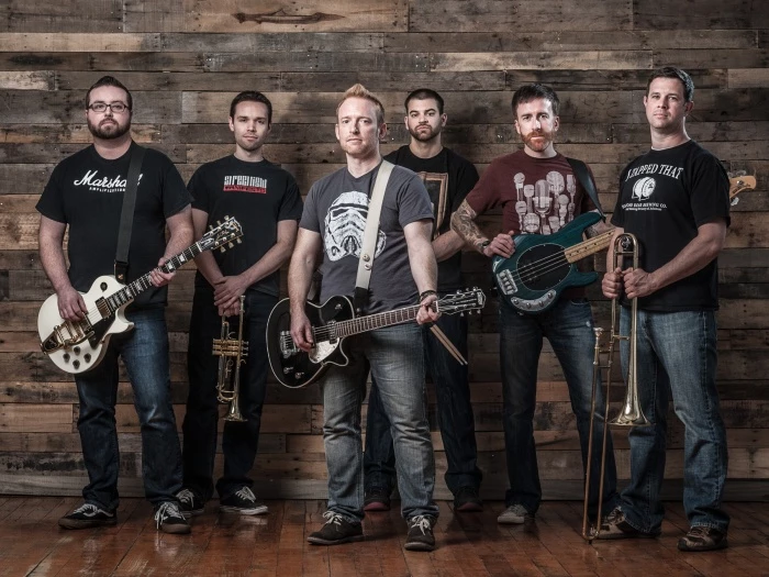band with instruments wood background