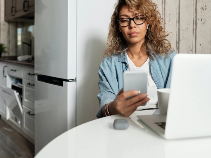 Photo Of Woman Using Her Mobile Phone