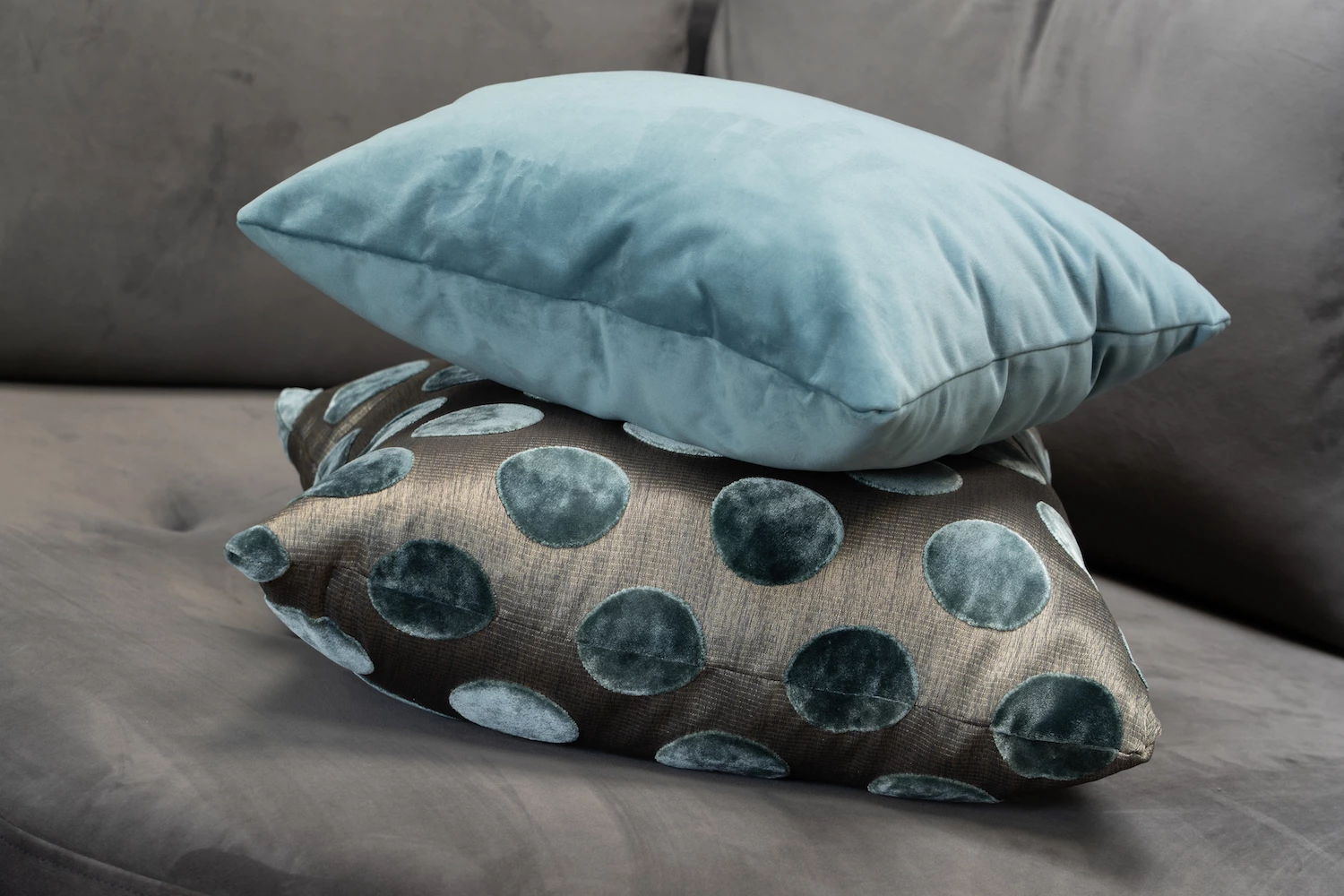 Cushions piled on sofa