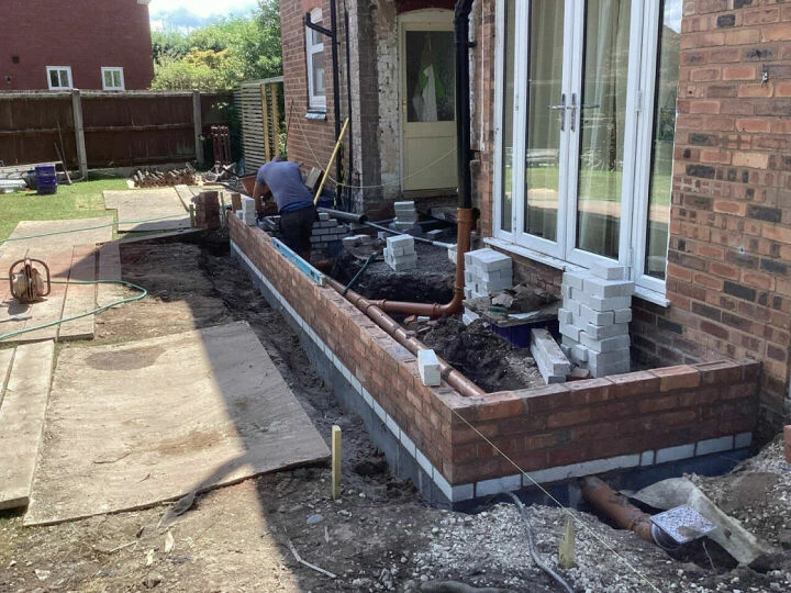 Home extension construction with brickwork and drainage installation by Nantwich Building Services in Cheshire