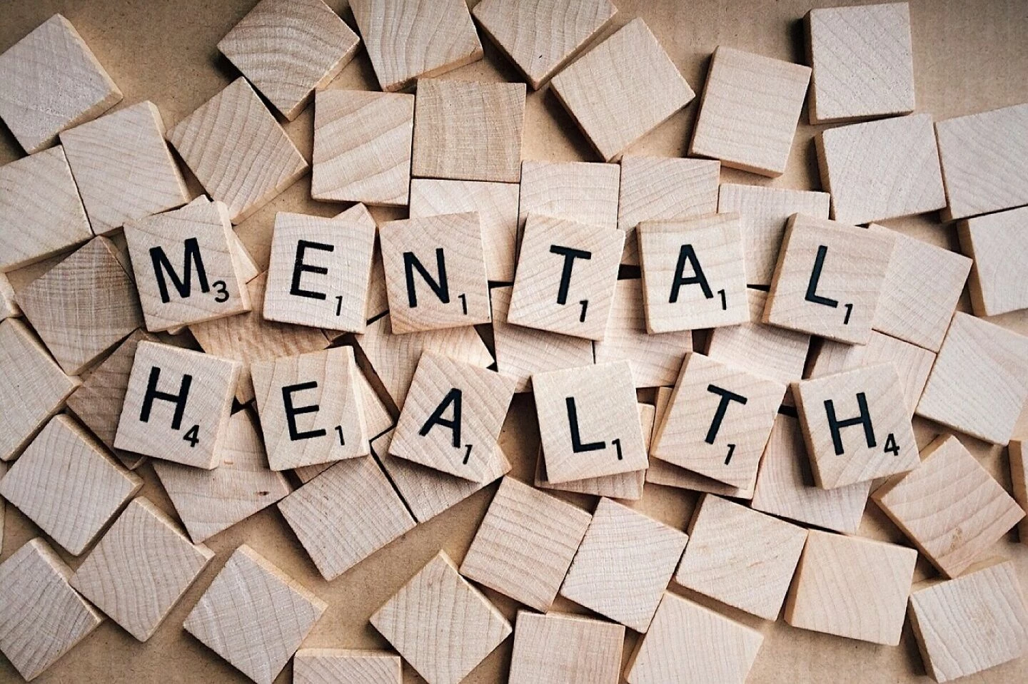 Mental health, wooden tiles, scrabble pieces