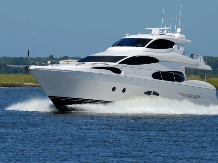 White Yacht on Running on Blue Body of Water during Daytime
