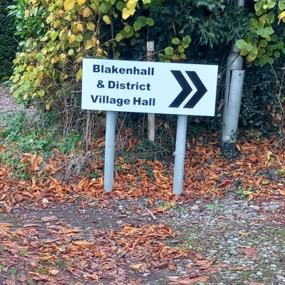 Sign pointing the way to Blakenhall and District Village Hall