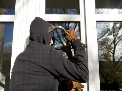 burglar opening window