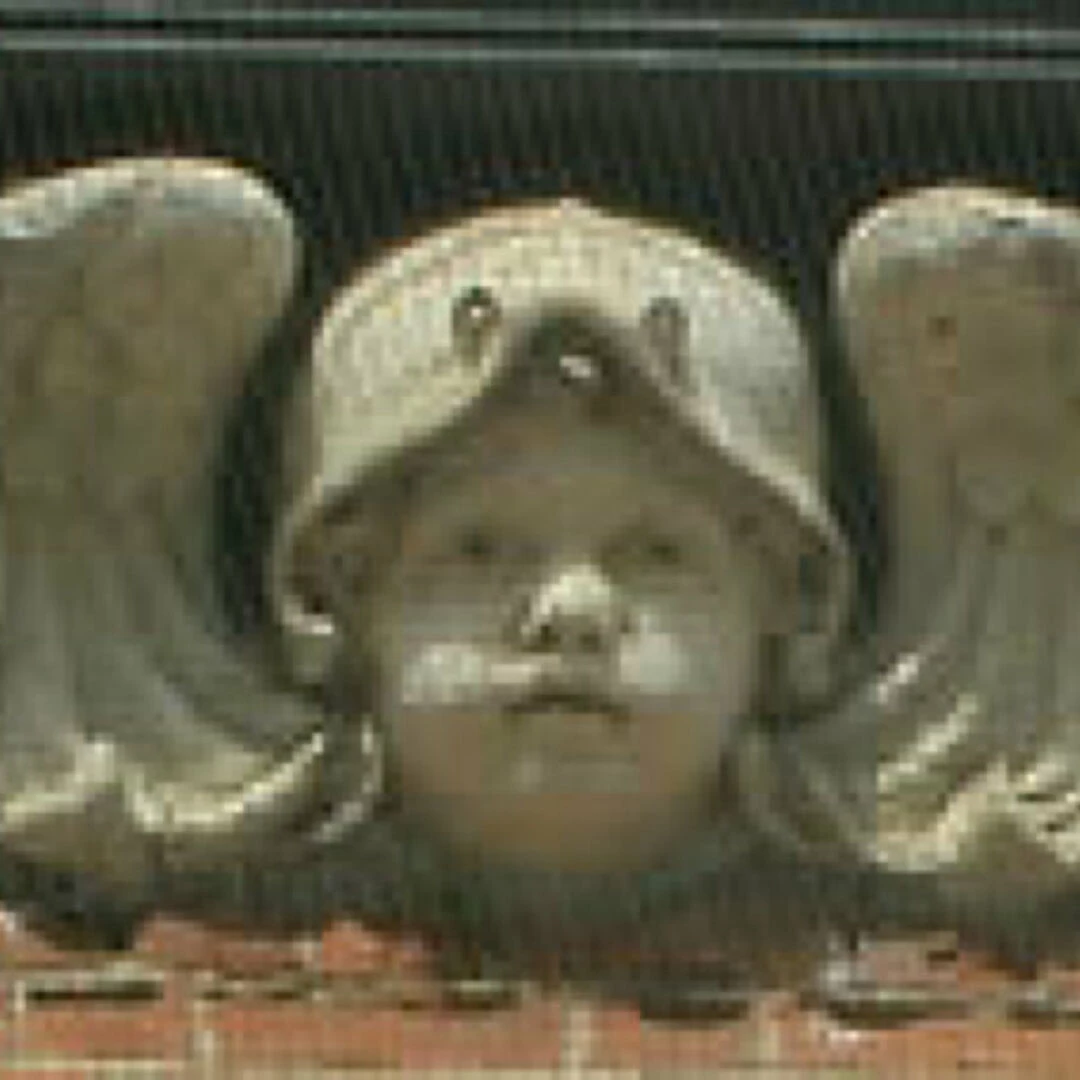 cherub on right hand side of c