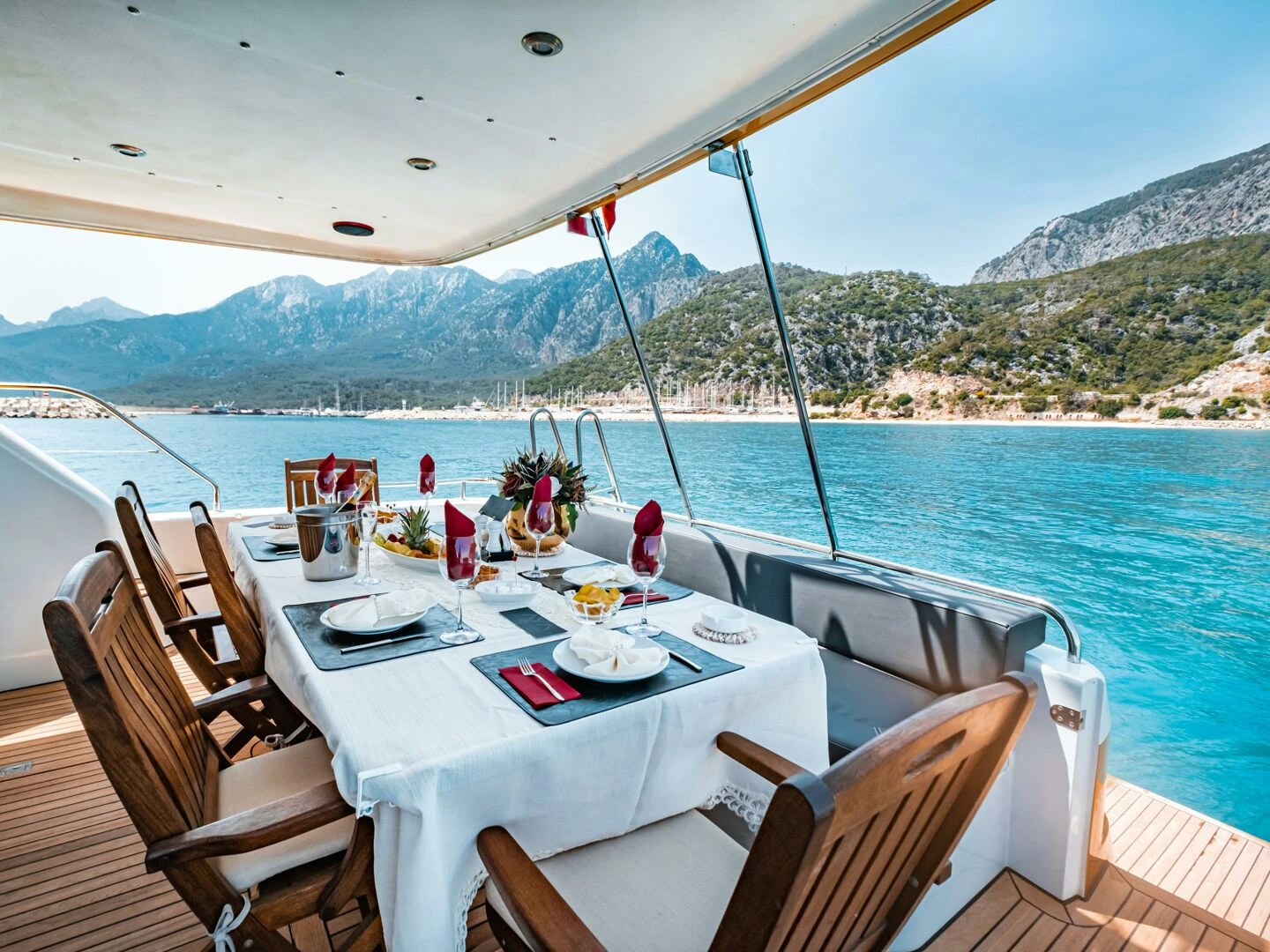 elegant dining setup on a yacht overlooking antalya39s scenic coast in trkiye