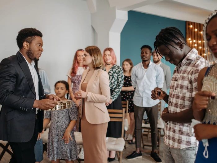 group of people standing and smiling