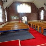 higham the new look  into the church from the front