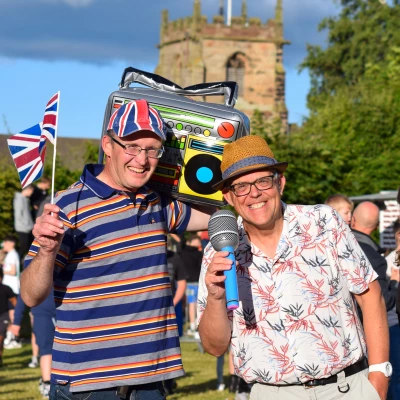 l r chris white and mark ray enjoy the music in the sunshine