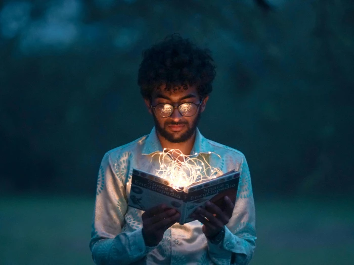 man holding book