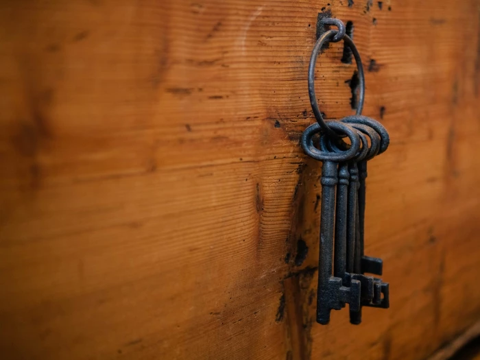 old keys hanging from a hook