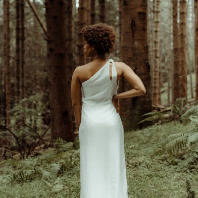one shoulder satin gown ruffle back view p