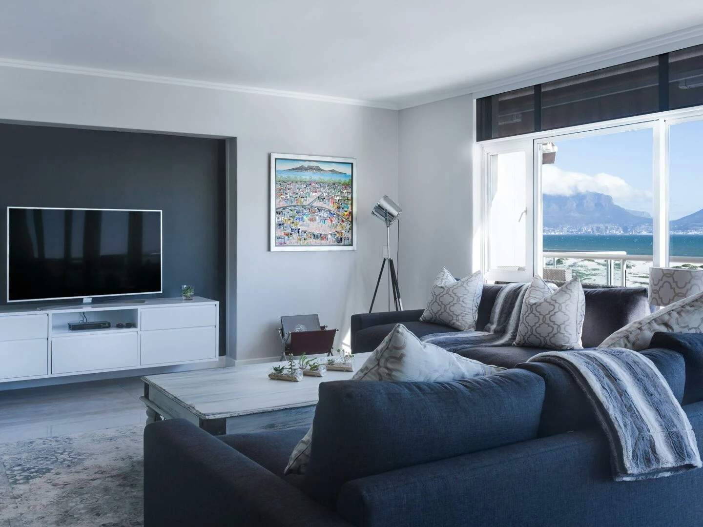 stylish living room with a view of table mountain blending modern design with natural beauty