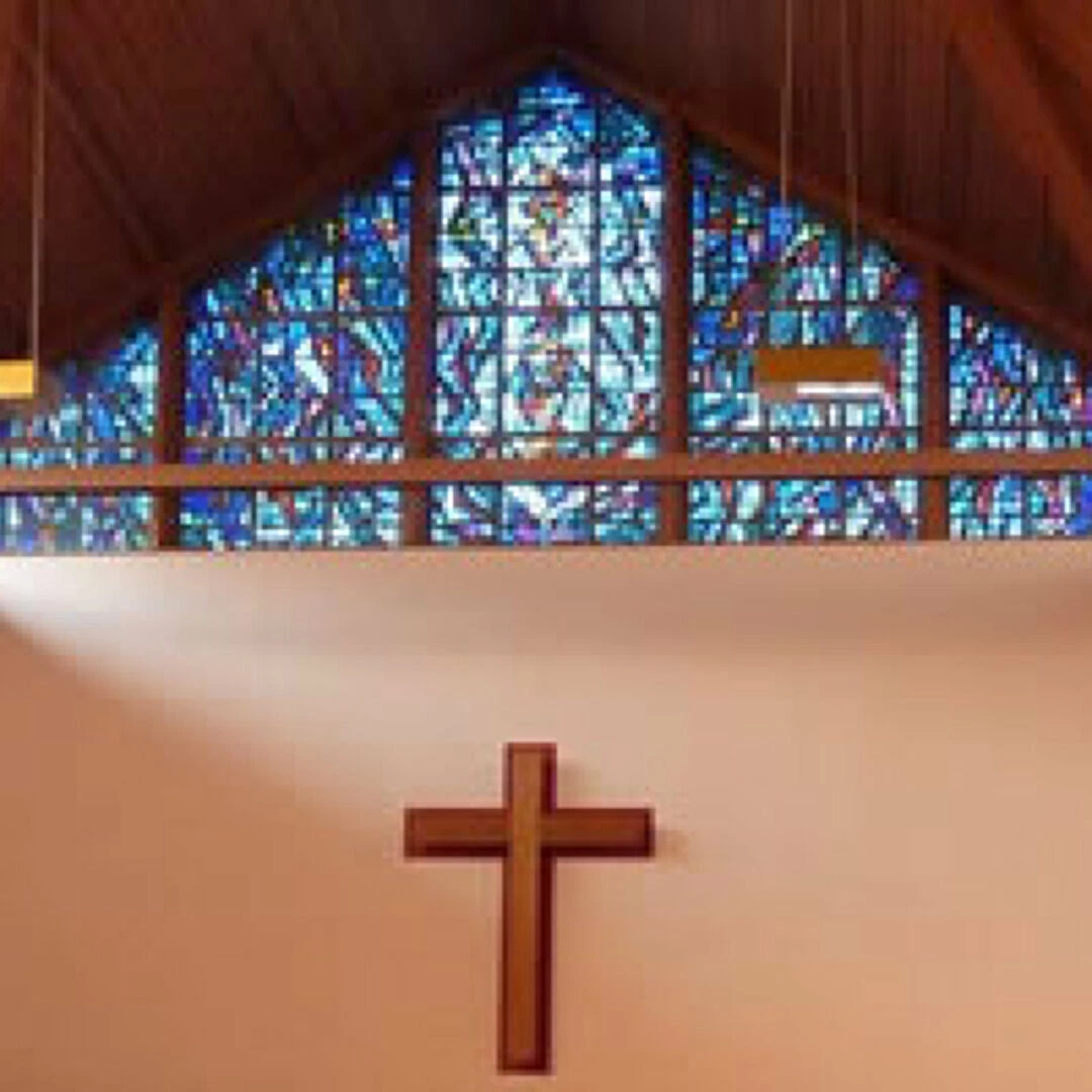 the window above the cross