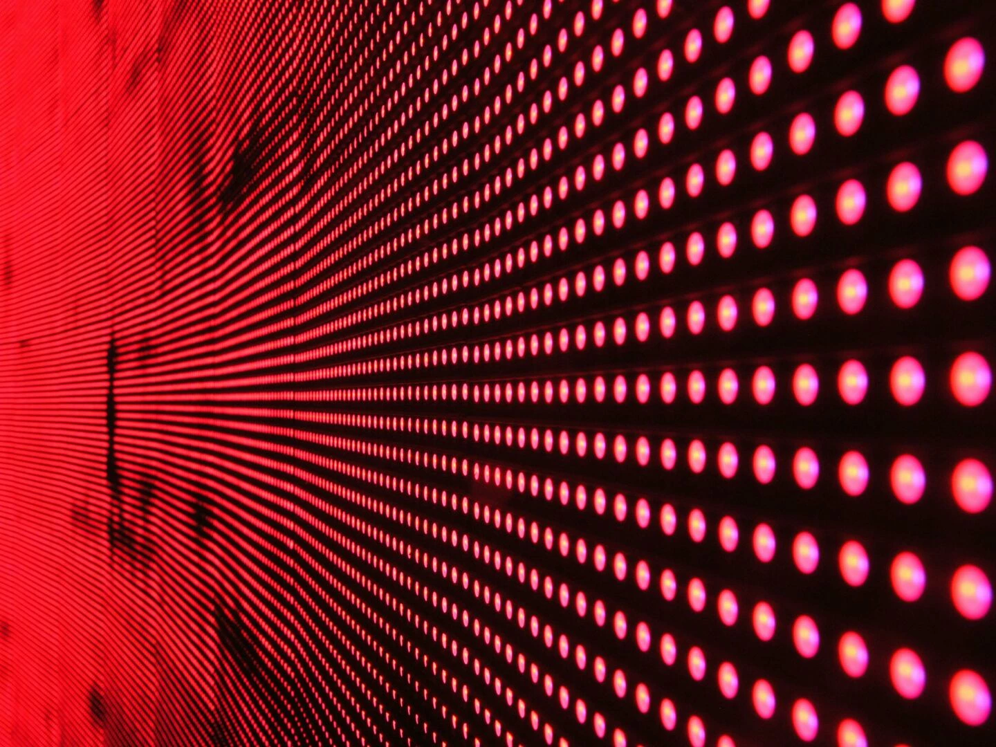 vibrant abstract pattern of illuminated red led lights forming a dynamic design